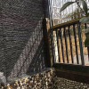 黑色流水石供應(yīng) 別墅外墻天然文化流水石 青石花園墻疊水石